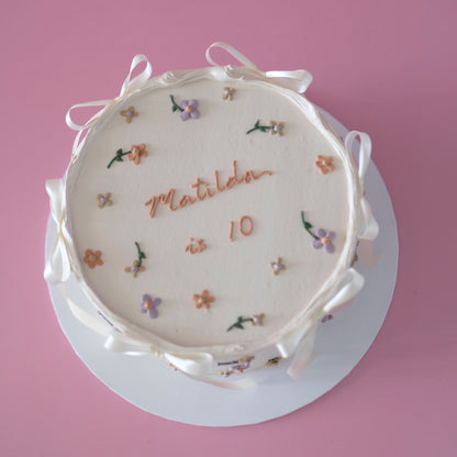 Springtime Daisy & Coquette Round Buttercream | Doodle Cake