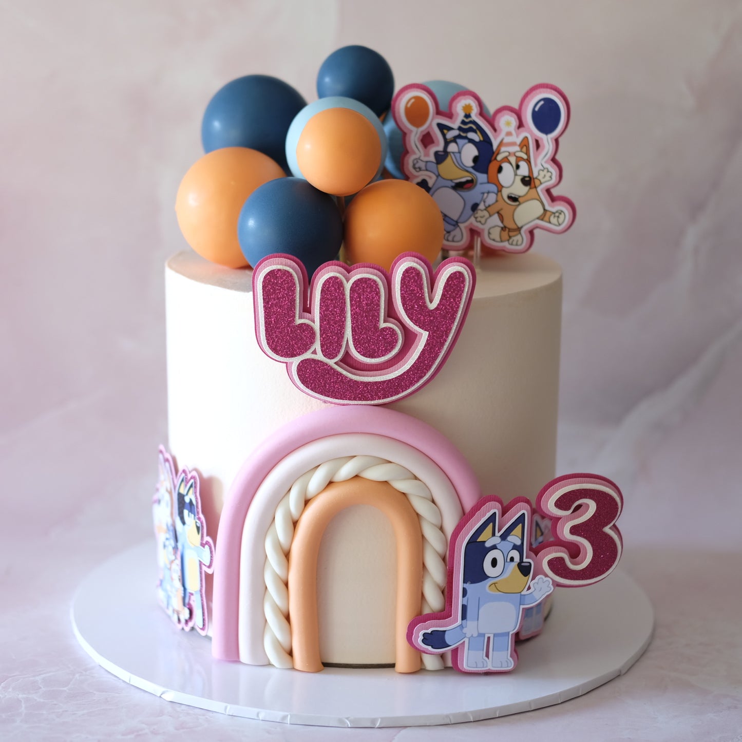 Bluey Bingo Themed Rainbow Cake