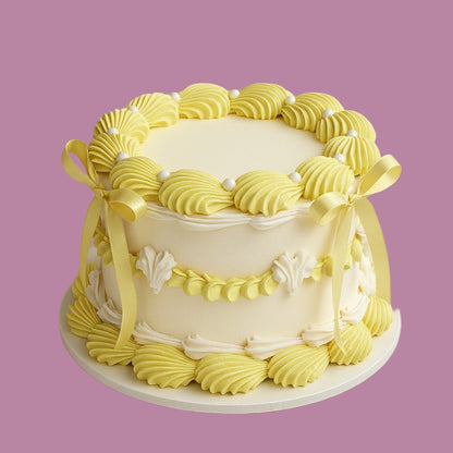 Decorative cake with yellow and white icing on a beige background