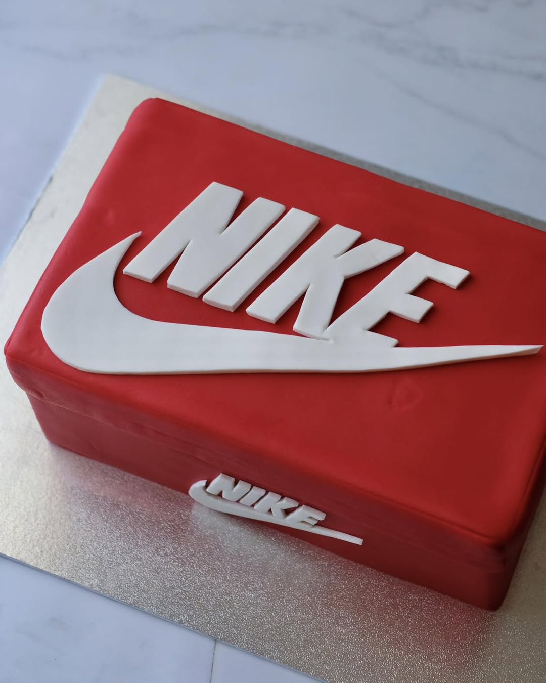 Nike Shoe Box Themed Novelty Cake - top view of NIKE logo and swoosh Brisbane