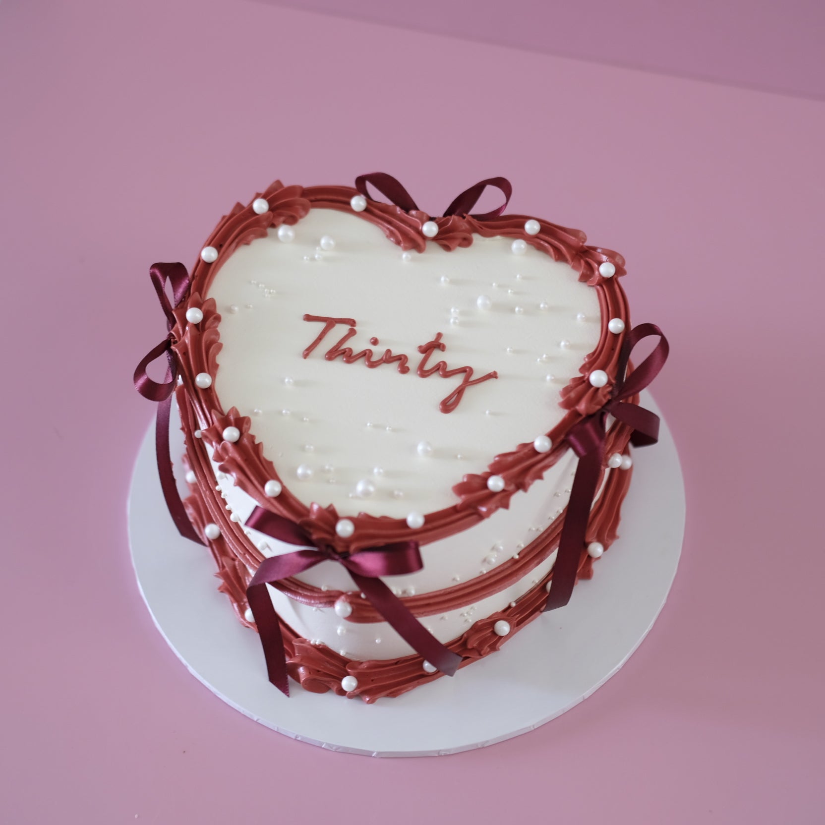 Vintage Heart Cake Merlot Coquette - angle view with coquette bows Brisbane