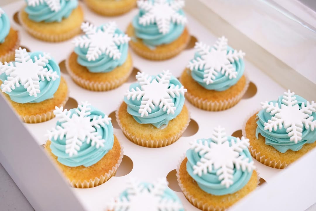 Frozen Snowflake Cupcakes - blue swirl cupcakes with white fondant snowflakes Brisbane