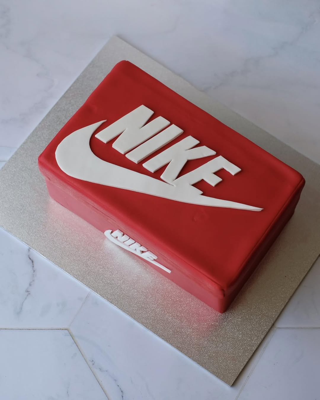 Nike Shoe Box Themed Novelty Cake - red fondant shoebox with white NIKE lettering Brisbane